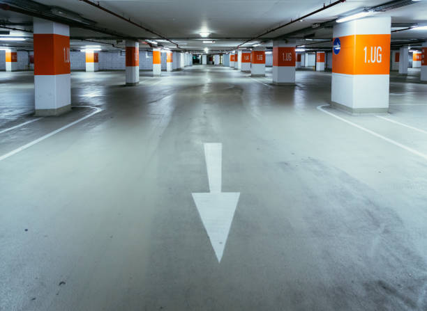 istock Parking garage in the underground. Asphalt and empty parking lots. 1147107441