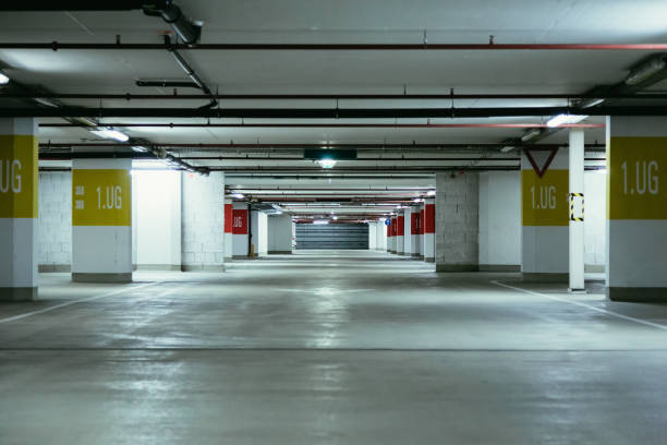 istock Parking garage in the underground. Asphalt and empty parking lots. 1147107458