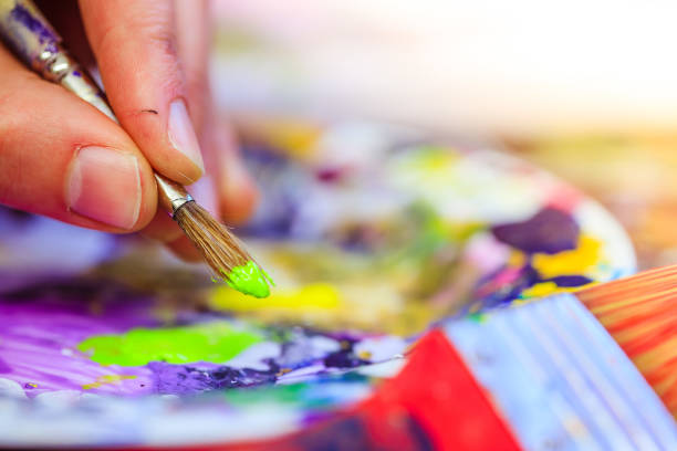 istock Painting artwork: paint brushes on painting background 1147108184