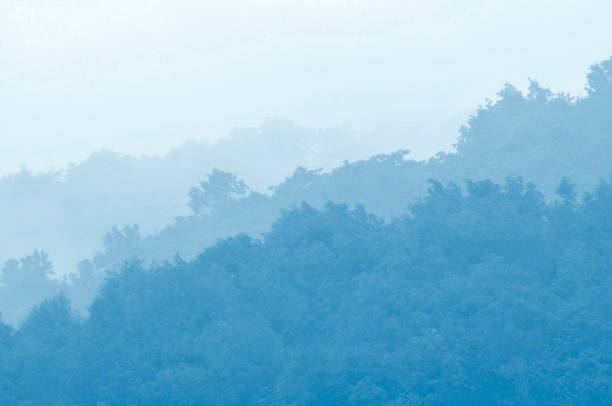 istock Gray clouds over mountain forest in autumn 1147108454
