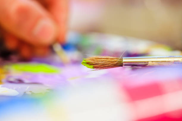 istock Painting artwork: paint brushes on painting background 1147108548