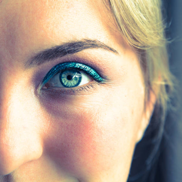 istock Female eye with beautiful blue make-up, close up 1147108995