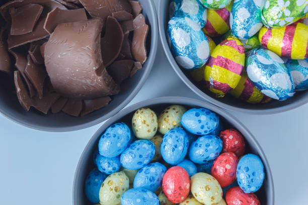 Chocolate easter eggs and pieces of a chocolate easter bunny