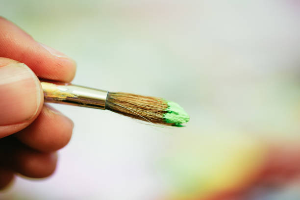 istock Painting artwork: paint brushes on painting background 1147109648