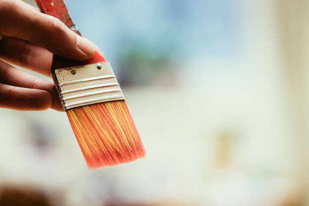 istock Painting artwork: paint brushes on painting background 1147110067