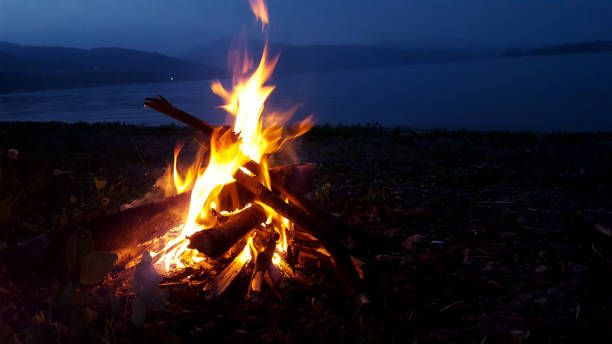 istock Bonfire on the lake in the mountains. 1147116193