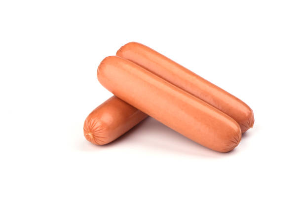 istock Three fresh boiled sausages isolated on white background. 1147120226