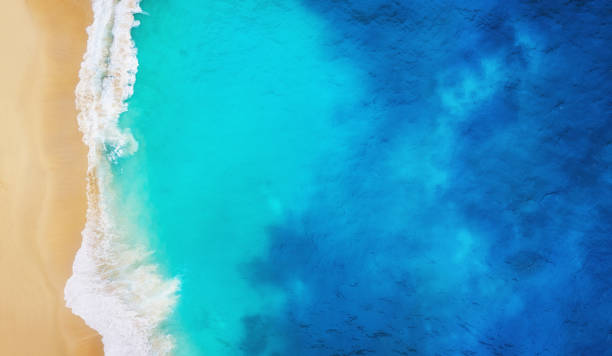 istock Coast as a background from top view. Turquoise water background from top view. Summer seascape from air. Nusa Penida island, Indonesia. Travel - image 1147120255