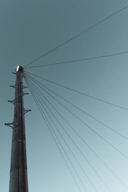 istock Telephone pole against a clear sky 1147120881