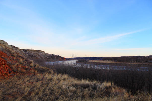 istock River running through the Canadian Badlands 1147122352