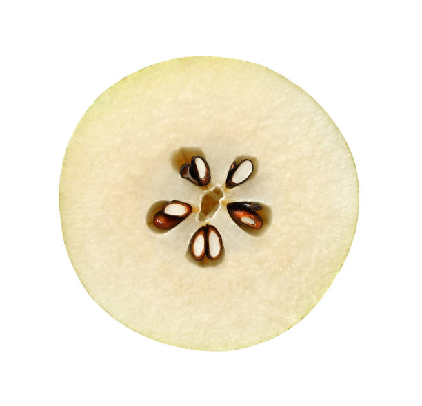 istock Pear cut across the inner part isolated on white background with clipping path. 1147123403