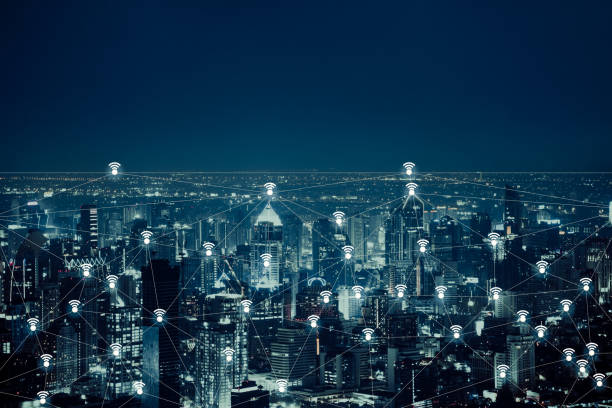 istock The abstract image of wireless network and wifi connection technology concept with bangkok city background at night in Thailand 1147125193