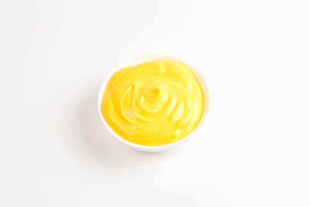 istock Cheese sauce in white plate on white background. 1147125379