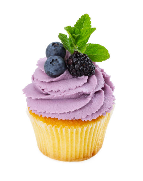 istock Cupcake with fresh blackberry, blueberries and mint 1147126397