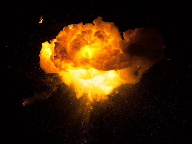 istock Realistic fiery bomb explosion with sparks and smoke isolated on black background 1147128703