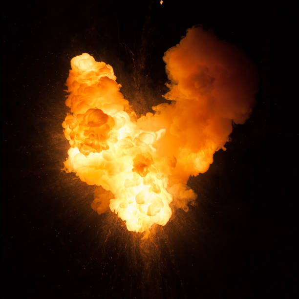 istock Realistic fiery gas explosion with sparks over a black background 1147128793