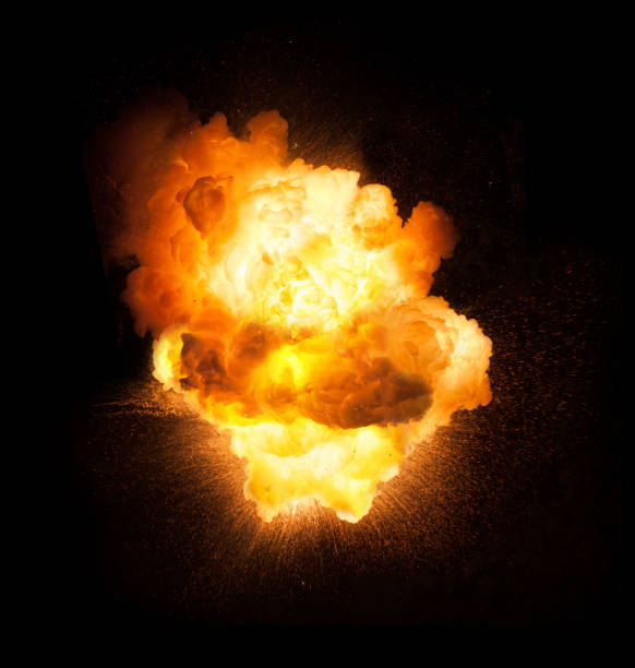 istock Realistic fiery bomb explosion with sparks and smoke isolated on black background 1147128931