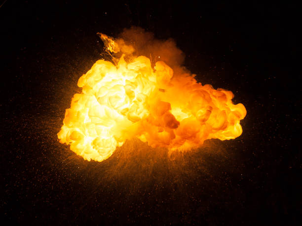 istock Realistic fiery bomb explosion with sparks and smoke isolated on black background 1147129810