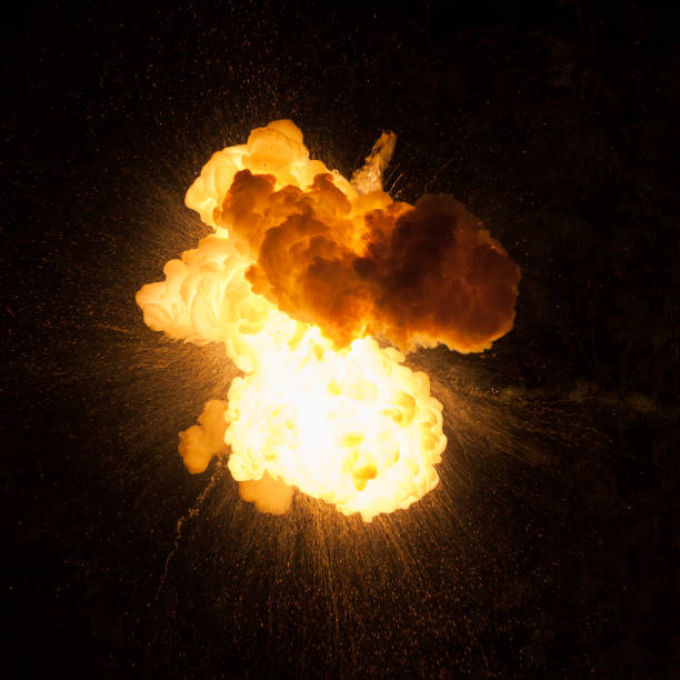 istock Realistic fiery bomb explosion with sparks and smoke isolated on black background 1147129868