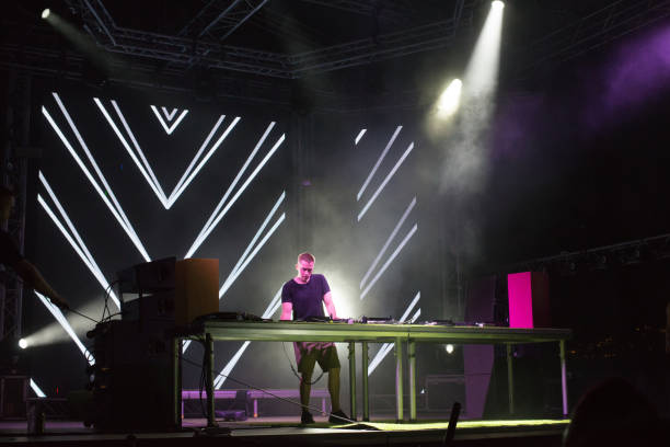 istock Dj playing techno music in the nightclub 1147131132