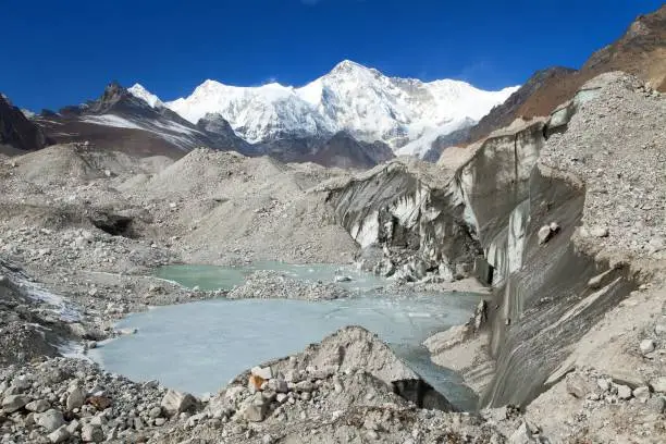 View of mount Cho Oyu and lake on Ngozumba glacier near Gokyo village - Gokyo trek, trek to Cho Oyu base camp and three passes trek, Gokyo valley, Sagarmatha national park, Nepal Himalayas mountains