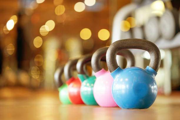 istock Colorful kettlebells in gym 1147137217