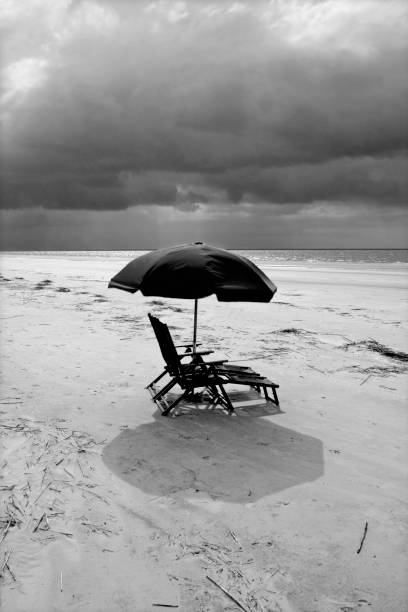 istock Raining at the Beach captured in black and white 1147137901