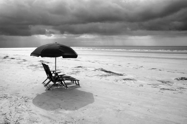 istock Raining at the Beach captured in black and white 1147137907