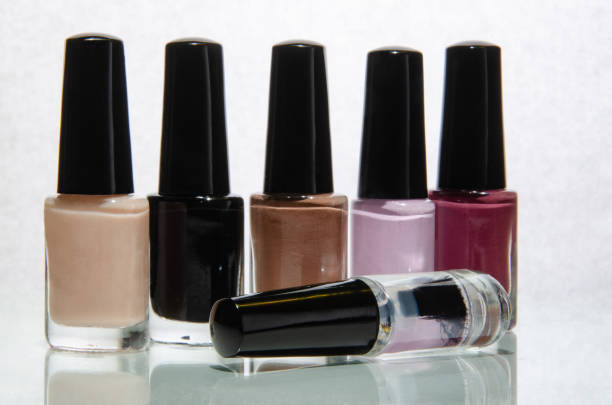istock Bottles with nail polish on a white surface. 1147140697