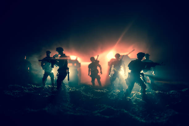 war concept. military silhouettes fighting scene on war fog sky background, fighting silhouettes below cloudy skyline at night. battle scene. army vehicle with soldiers. army - car individuality military 4x4 imagens e fotografias de stock