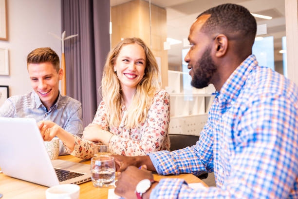 istock Group of business people at the office 1147147510