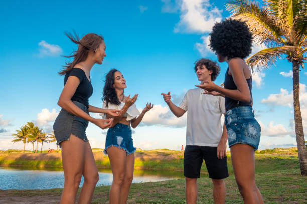 istock Friends talking in the park 1147149926