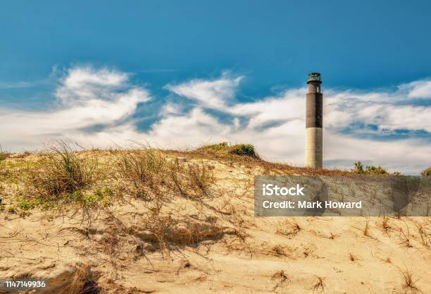 Lighthouse On The Hill Stock Photo - Download Image Now - Oak Island - North Carolina, Beach, North Carolina - US State
