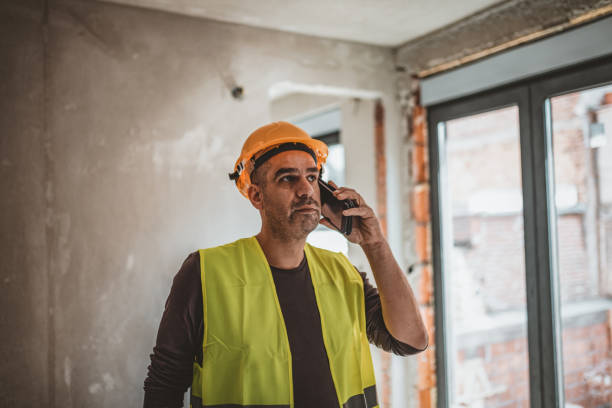istock Building Worker at the Construction Yard in Communication 1147150036