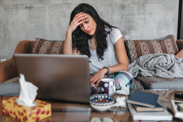 istock Young Woman Sick At Home 1147152414