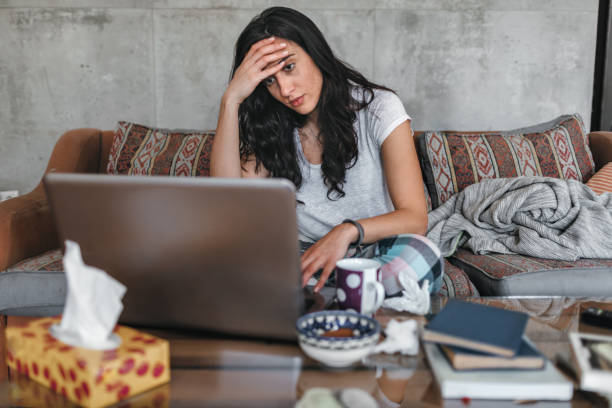 istock Young Woman Sick At Home 1147152415