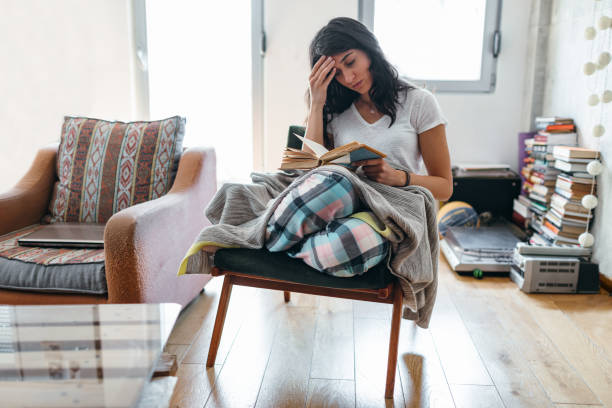 istock Young Woman Sick At Home 1147152438