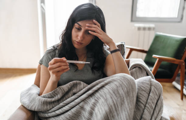 istock Young Woman Sick At Home 1147152440