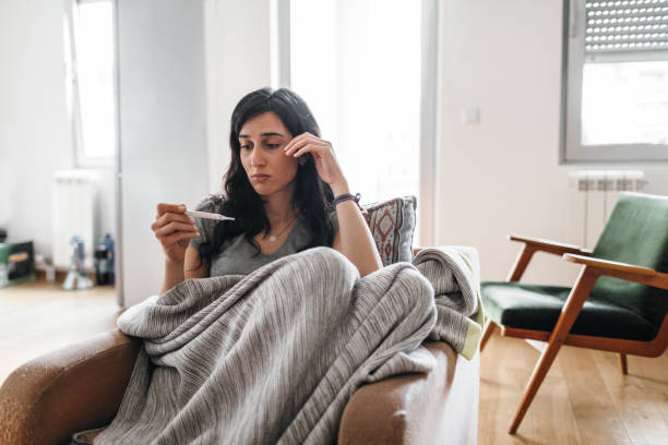 istock Young Woman Sick At Home 1147152469