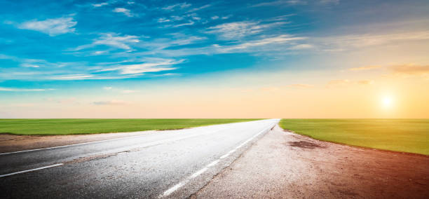 istock Panoramic road sunrise summer travel 1147154649