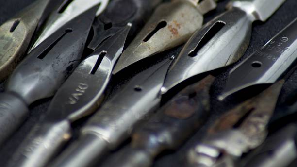 istock Old metal pen nibs 1147157609