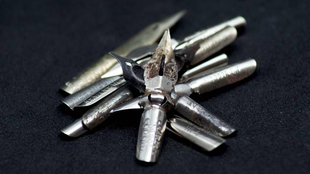 istock Old metal pen nibs 1147157618
