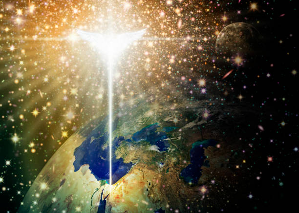 Digital illustration of the Christmas star and angel shining down over Bethlehem, as viewed from outer space. Space and stars are digitally illustrated. Credit NASA for earth and moon images.