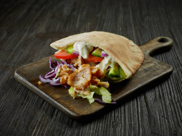 istock doner kebab on wooden cutting board 1147164468