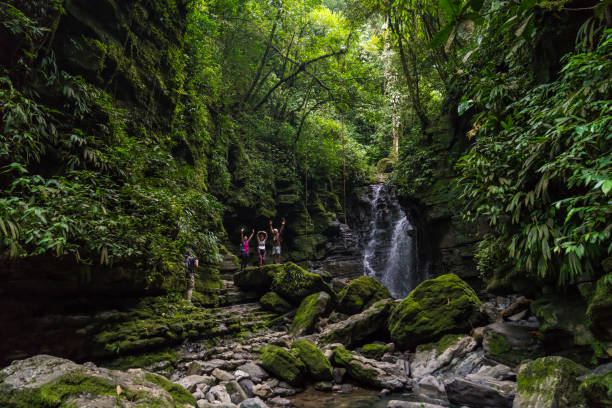 istock Small group of people at the waterfall 1147164582
