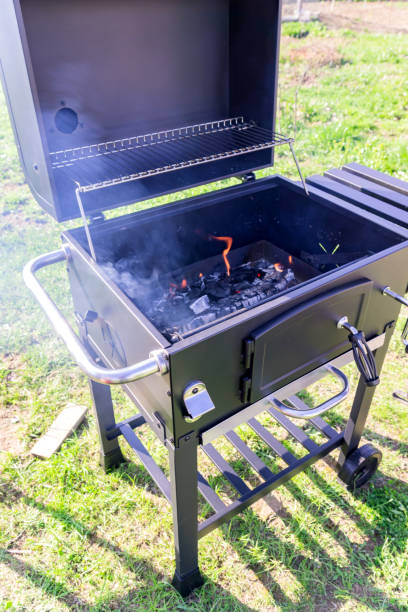 istock open grill bbq with hot charcoal ready for cooking meat and vegetables 1147172246