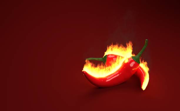 istock Hot chili peppers on fire 1147174964