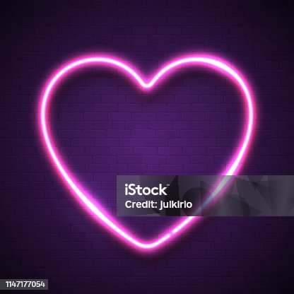 istock Pink heart background on dark violet brick wall. Neon electric effect element. Glamour luxury shining light bulb sign. Love frame. Led lights technology banner. 3d realistic shape vector illustration. 1147177054