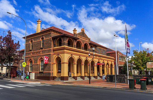 The heritage listed Post Office Building was erected in 1880 in Victoria Free Classical pallazo architecture with a stuccoed arched loggia, in Armidale, NSW, Australia