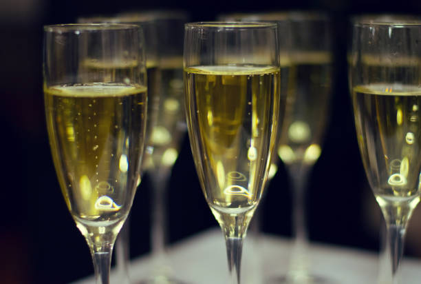 istock Glasses of champagne on a table. 1147179611